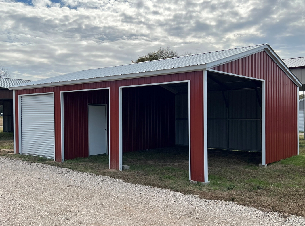 metal building with roll up doors and two bays